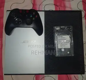 Photo - xbox one 1tb with 28 games