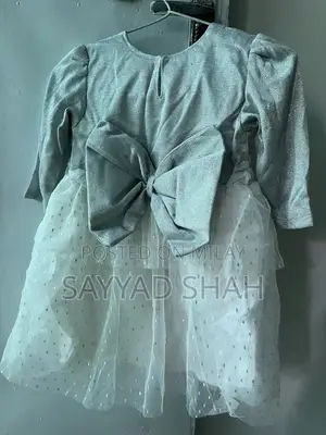 Photo - Elegant white kids Frock with net skirt