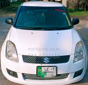 Photo - Suzuki Swift 2011 White