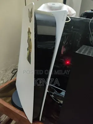 Photo - Playstation 5 Digital With Two Controllers