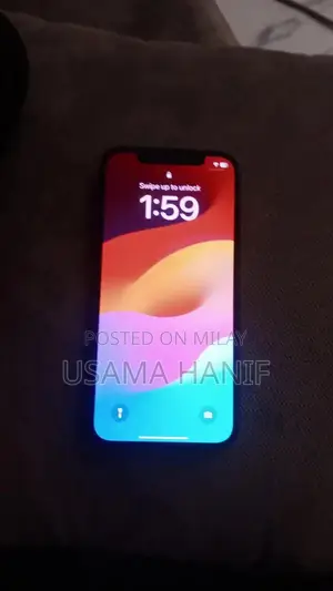 Photo - Apple iPhone 12 Dark Blue 64GB Unlocked Smartphone