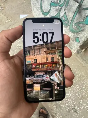 Photo - Compact Smartphone with Minor Back Damage