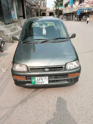 Photo - Daihatsu Cuore 2010 Single-Owner Used Car with New Tires