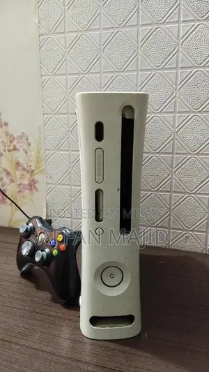 Photo - Xbox 360 Gaming Console with HDMI, 2 Controllers & 25+ Games
