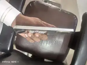 Compact Smartphone with Full Warranty and Original Accessories