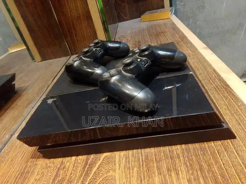 PlayStation 4 Fat Console with Games and Accessories Bundle