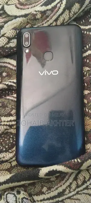 Photo - Lightly Used Smartphone with Original Packaging