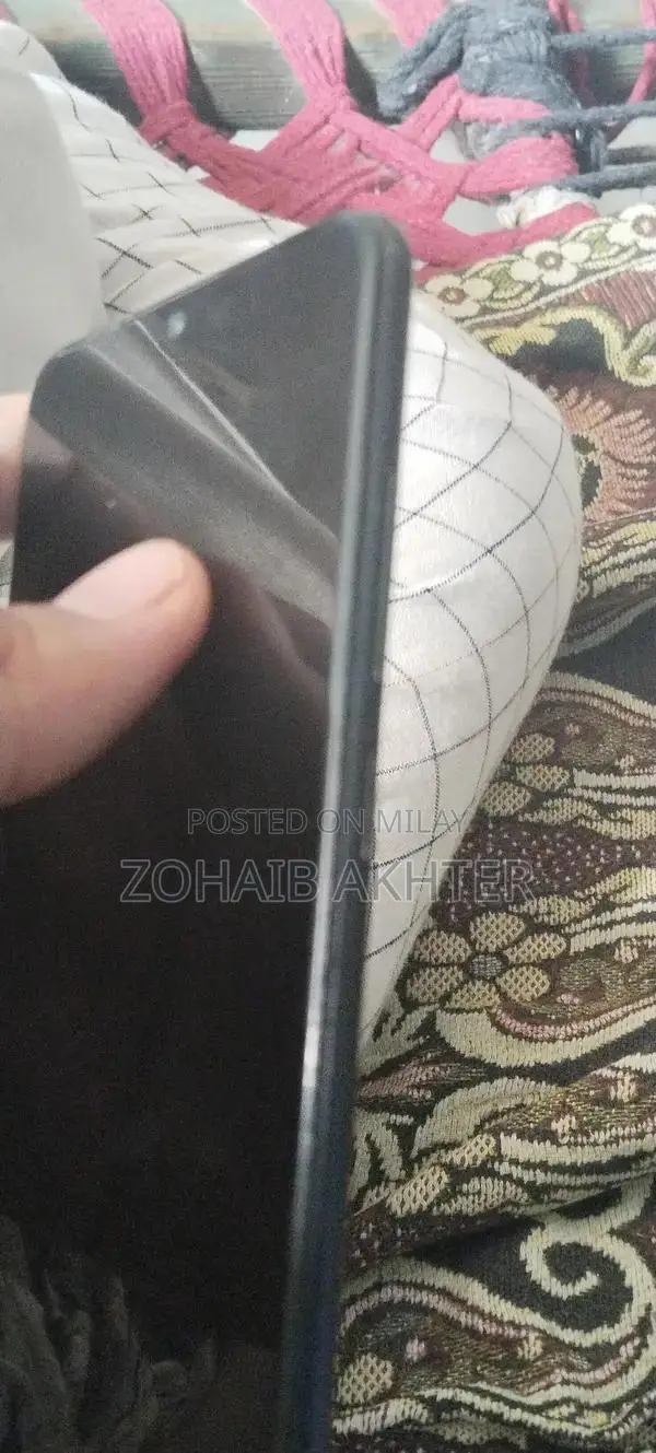 Lightly Used Smartphone with Original Packaging