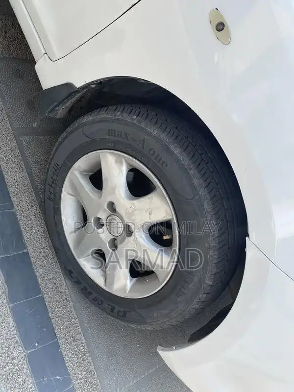 Toyota Belta Sedan - Efficient Urban Compact Car