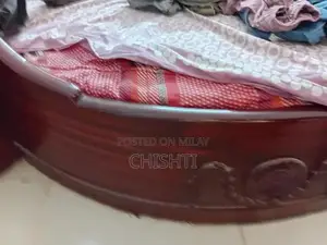 Photo - Round Bed Frame with New Mattress - Modern Sleeping Solution