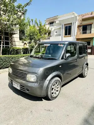Photo - Nissan Cube Compact Hatchback - Imported Japanese Midsize Vehicle