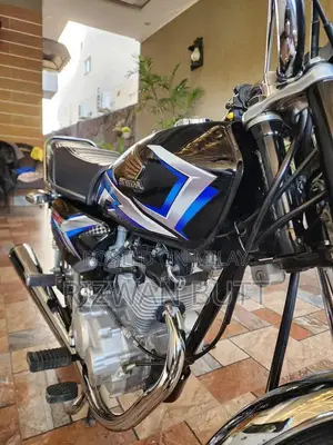 Photo - Honda 125cc Motorcycle - 2025 Model Black, Low Mileage