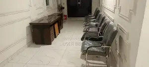 Photo - Office Furniture Set with Table and Rolling Chair