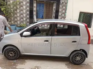 Daihatsu Mira Compact Sedan - Imported Silver Sedan