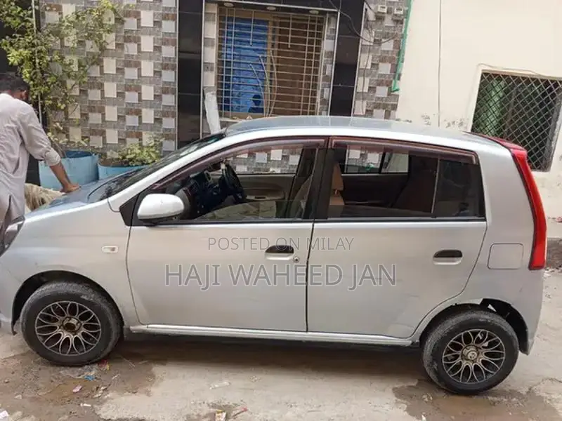 Daihatsu Mira Compact Sedan - Imported Silver Sedan