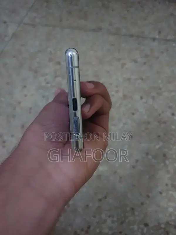 Compact Sony Smartphone with Triple Camera and OLED Display