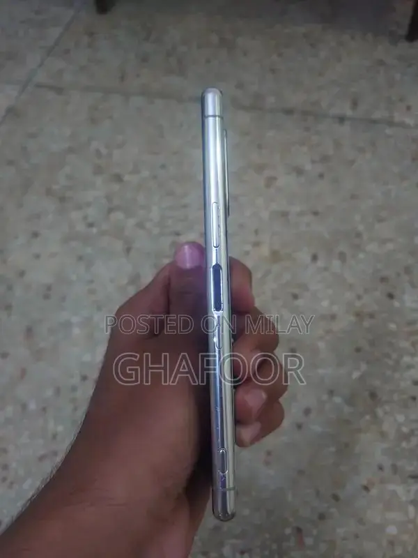 Compact Sony Smartphone with Triple Camera and OLED Display