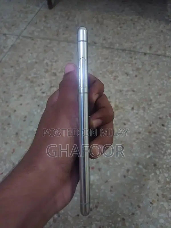 Compact Sony Smartphone with Triple Camera and OLED Display