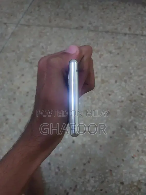 Compact Sony Smartphone with Triple Camera and OLED Display