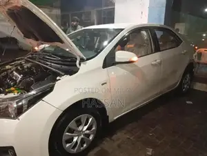 Photo - 2016 Toyota Corolla XLI Sedan - Low Mileage, Excellent Condition