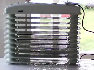 Photo - DeLonghi Electric Oil-Filled Radiator Heater with Thermostat