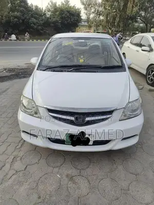 Photo - Honda City 2006 Sedan - Well-Maintained Compact Car