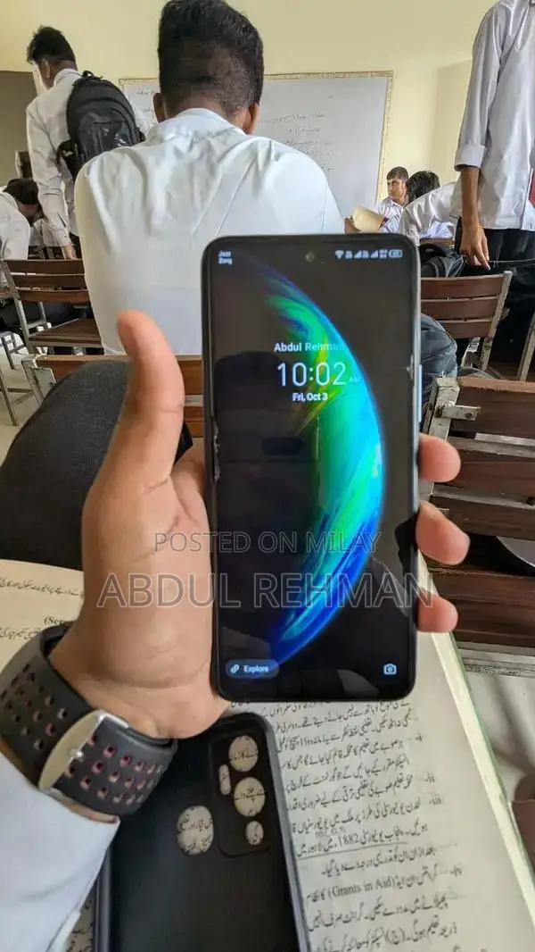 Sleek Compact Electronic Device with Accessories