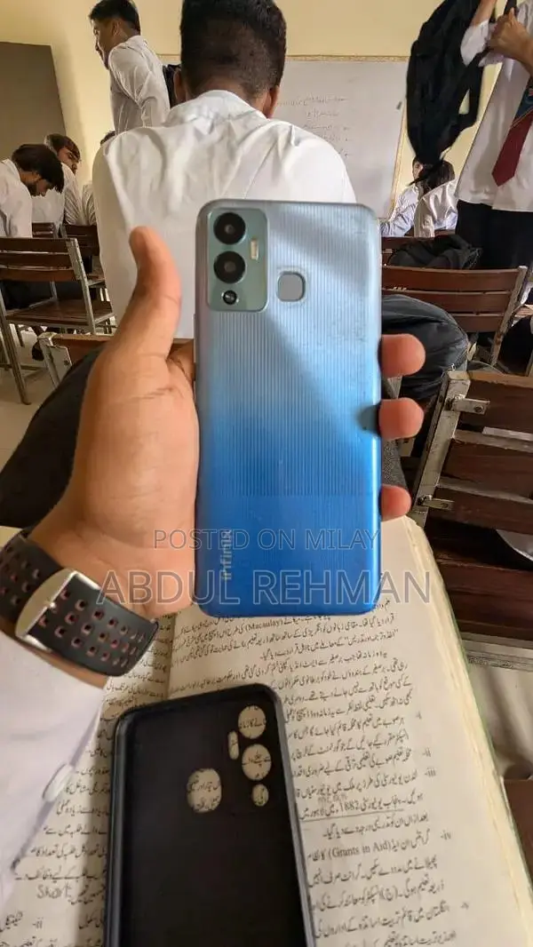 Sleek Compact Electronic Device with Accessories