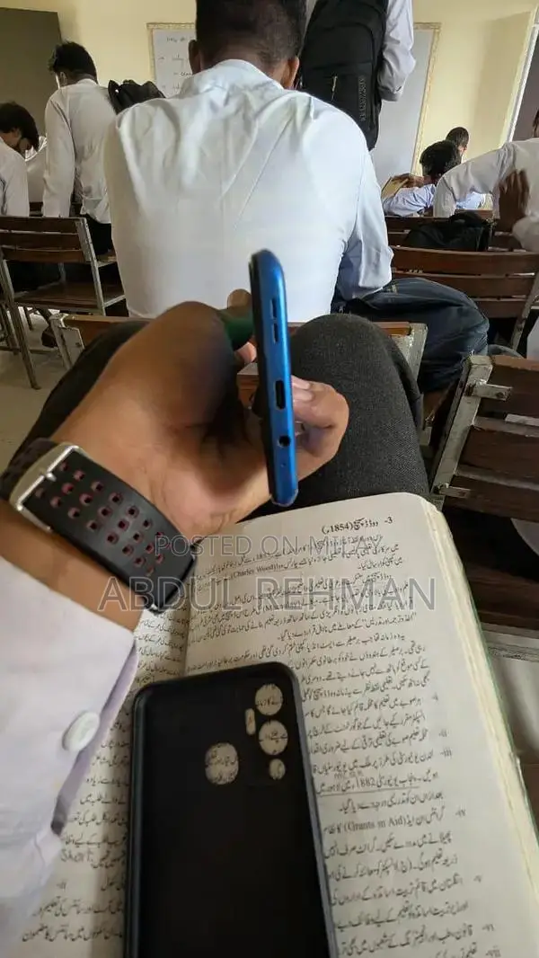 Sleek Compact Electronic Device with Accessories