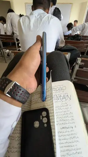 Sleek Compact Electronic Device with Accessories