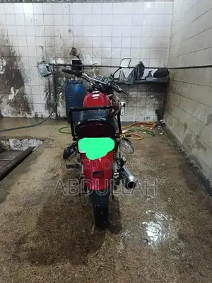 Photo - Suzuki GS150SE Motorcycle - 2021 Model Red Bike