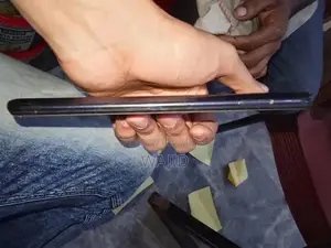 Compact Smartphone with Minor Wear and Functionality