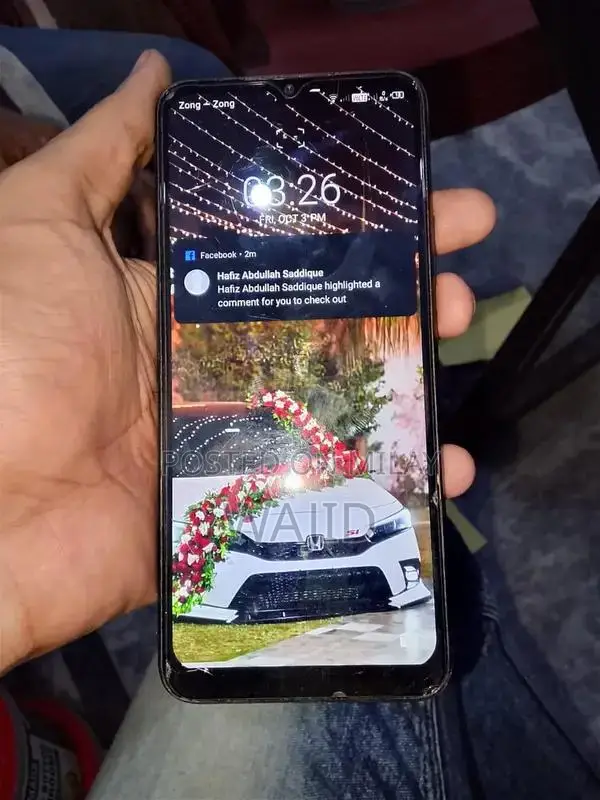 Compact Smartphone with Minor Wear and Functionality