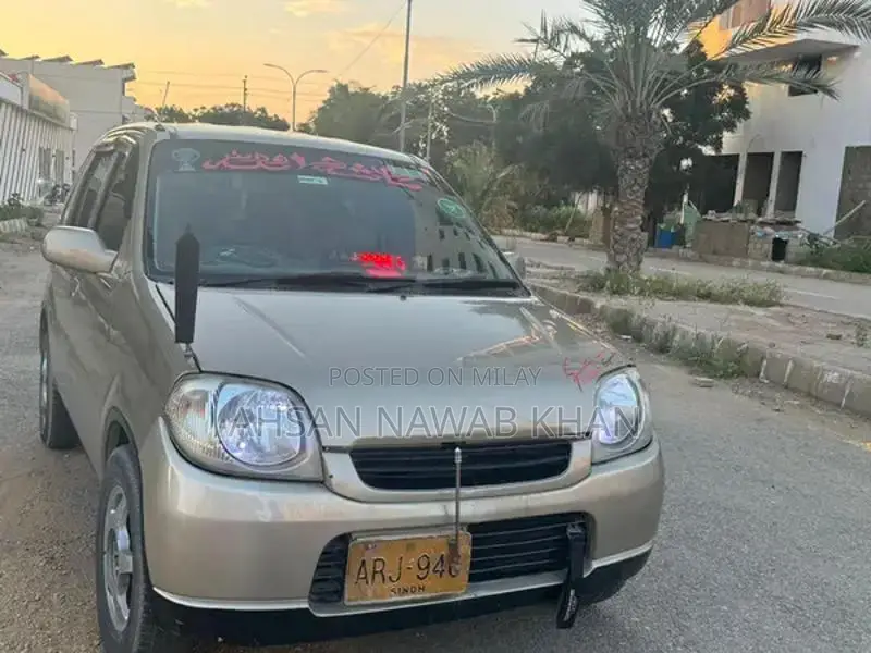 Japanese Kei Compact Vehicle with Body Shower Design