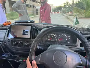 Japanese Kei Compact Vehicle with Body Shower Design