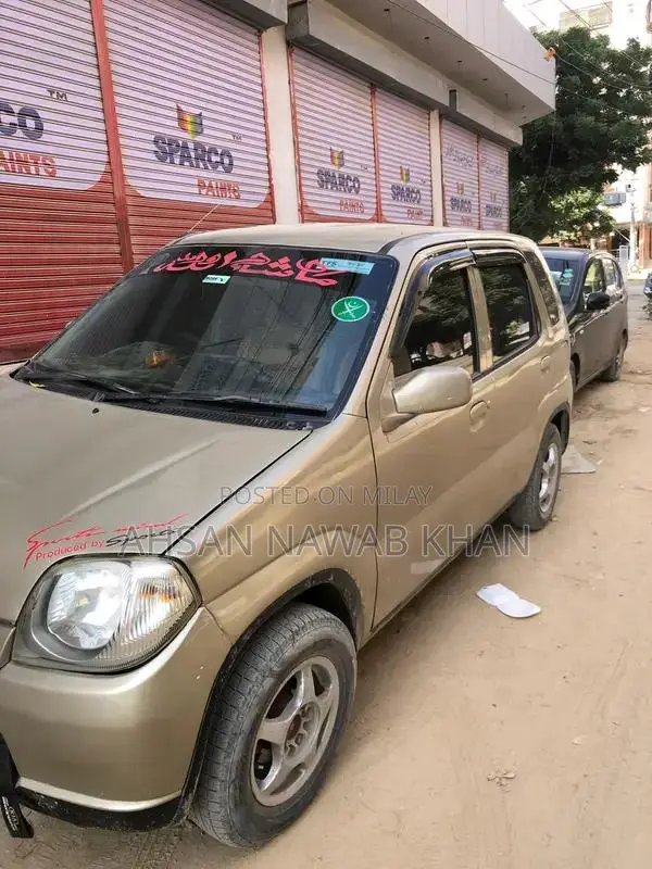 Japanese Kei Compact Vehicle with Body Shower Design