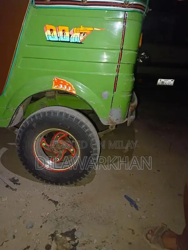 Ricksha Three-Wheeled Vehicle with Unique Engine Configuration