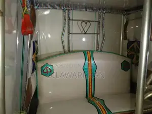 Ricksha Three-Wheeled Vehicle with Unique Engine Configuration