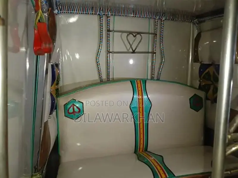 Ricksha Three-Wheeled Vehicle with Unique Engine Configuration