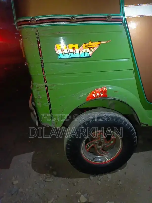 Ricksha Three-Wheeled Vehicle with Unique Engine Configuration