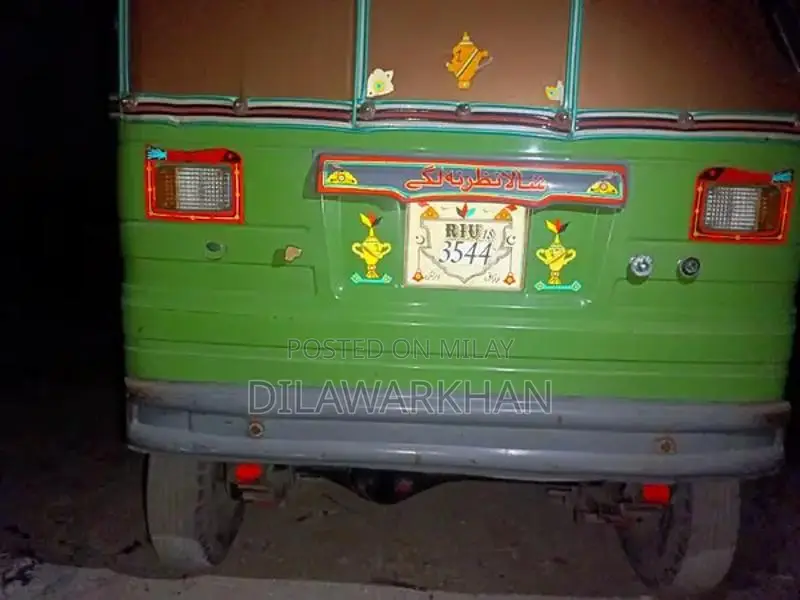 Ricksha Three-Wheeled Vehicle with Unique Engine Configuration