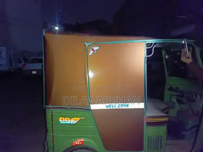 Ricksha Three-Wheeled Vehicle with Unique Engine Configuration