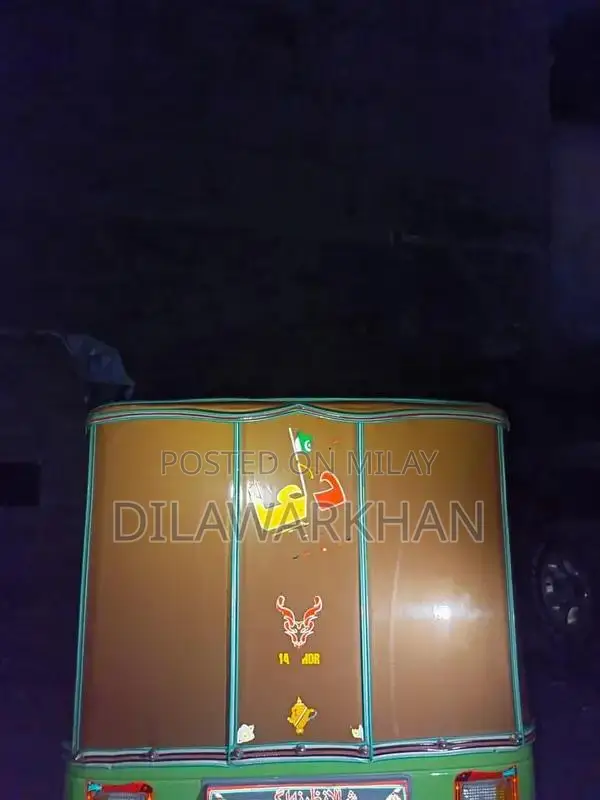 Ricksha Three-Wheeled Vehicle with Unique Engine Configuration