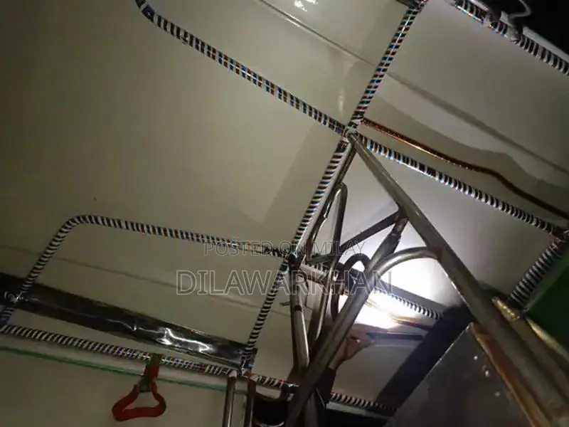 Ricksha Three-Wheeled Vehicle with Unique Engine Configuration