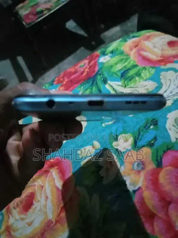 Used Mobile Device with Charger Available for Quick Sale