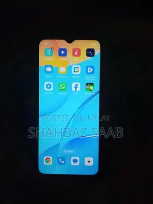 Used Mobile Device with Charger Available for Quick Sale