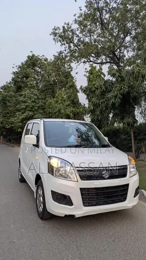 Photo - 2024 Suzuki Wagon R VXL: Low Mileage, White, Minor Cosmetic Wear, Well