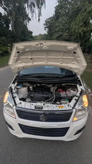 2024 Suzuki Wagon R VXL: Low Mileage, White, Minor Cosmetic Wear, Well