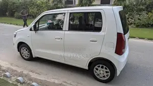 2024 Suzuki Wagon R VXL: Low Mileage, White, Minor Cosmetic Wear, Well