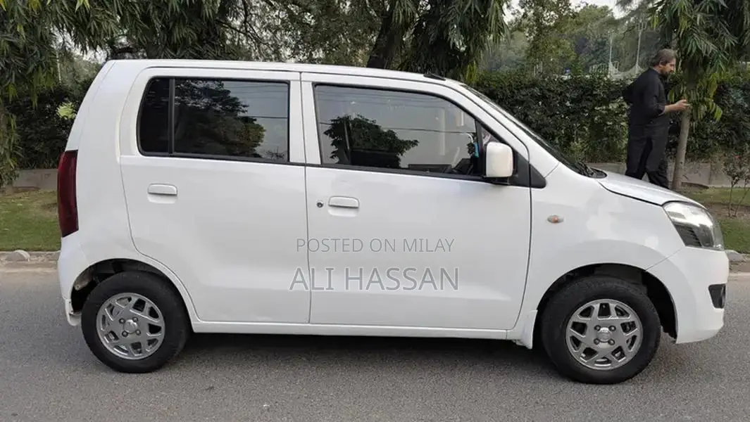 2024 Suzuki Wagon R VXL: Low Mileage, White, Minor Cosmetic Wear, Well